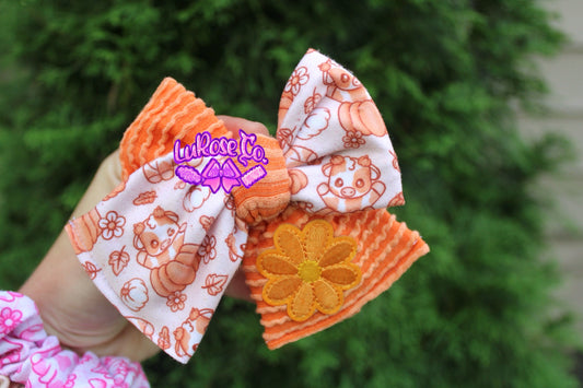 Pumpkin cow split bow with patch 4in