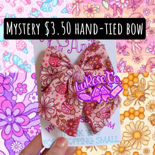 Mystery print hand-tied bow