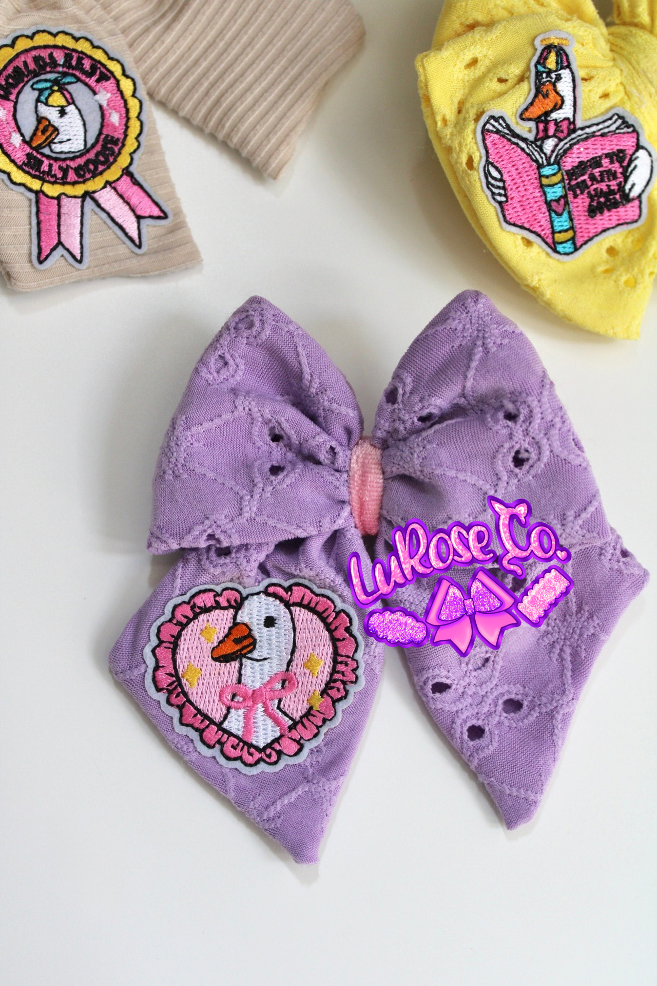 vintage goose purple eyelet bow on clip