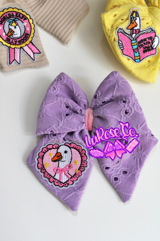 vintage goose purple eyelet bow on clip