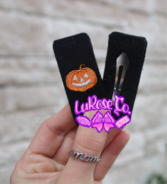 Orange embroidered pumpkin snap clip