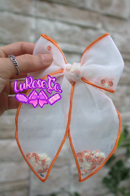 Orange thread Halloween shaker bow - glow in the dark