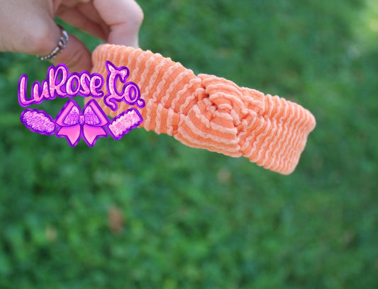 Orange waved knotted headband