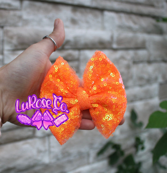 Orange sequins 4in bow on clip