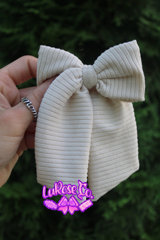 Beige solid rib simple long tailed bow