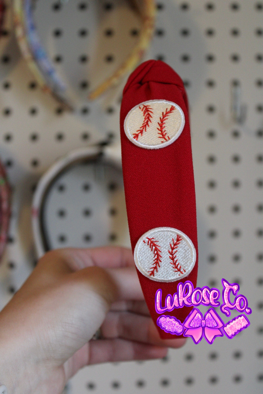 Red knotted headband with baseball patches