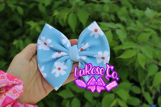 5in blue daisies bow on clip